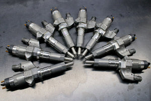 Chevy Duramax 01-04 LB7 Reman Injector Set 100 Percent Over SAC Nozzle Dynomite Diesel